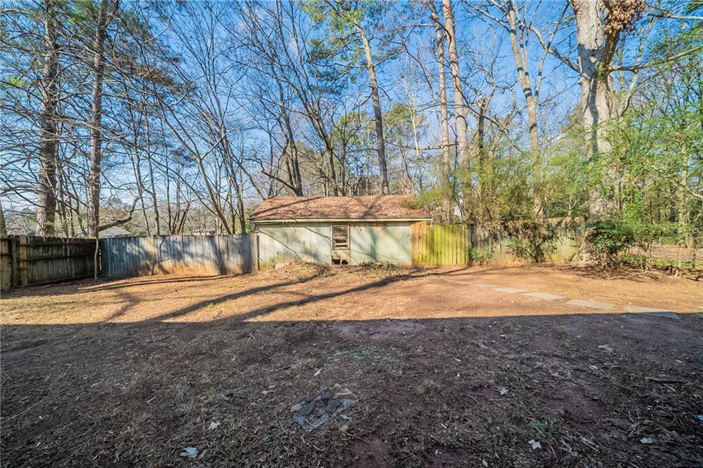 1433 Dennis Drive Decatur, GA 30032 - Photo 25 of 28 a view of a yard with large trees