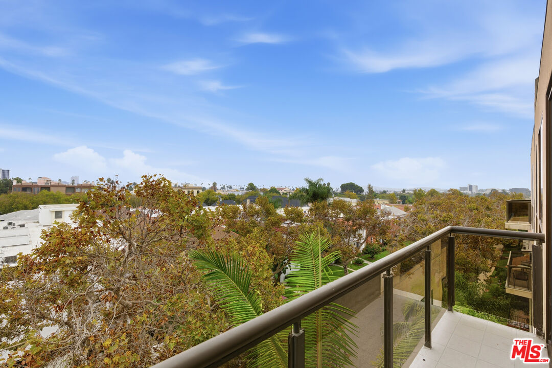 121 South Canon Drive, Unit PH 401 Beverly Hills, CA 90212 - Photo 27 of 31 a view of a city and mountain