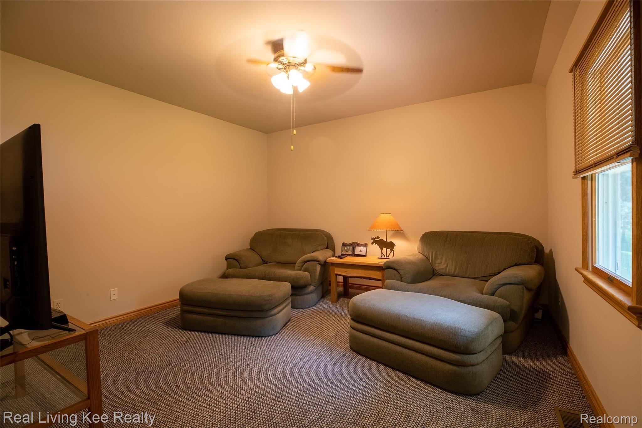 4230 Blood Road Metamora, MI 48455 - Photo 14 of 49 Currently a TV room, this could be a 1st floor office or 4th bedroom (Seller would add a closet if buyer prefers).