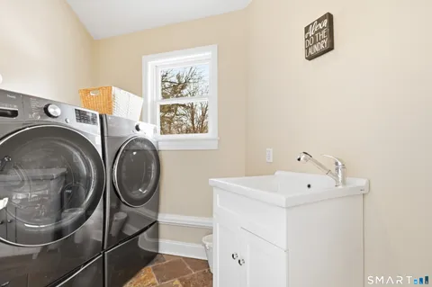 a utility room with dryer and washer