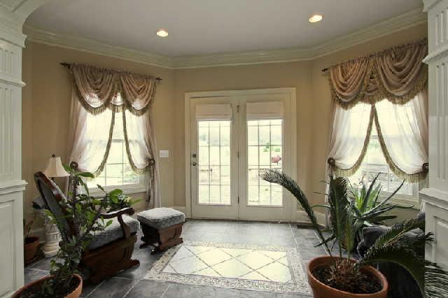 2210 Skinner Road Arrington, TN 37014 - Photo 15 of 20 Your own private sitting room off the master bedroom. Snuggle into a chair and enjoy a good book or a nap...it's your choice...and overlook the backyard...and patio.