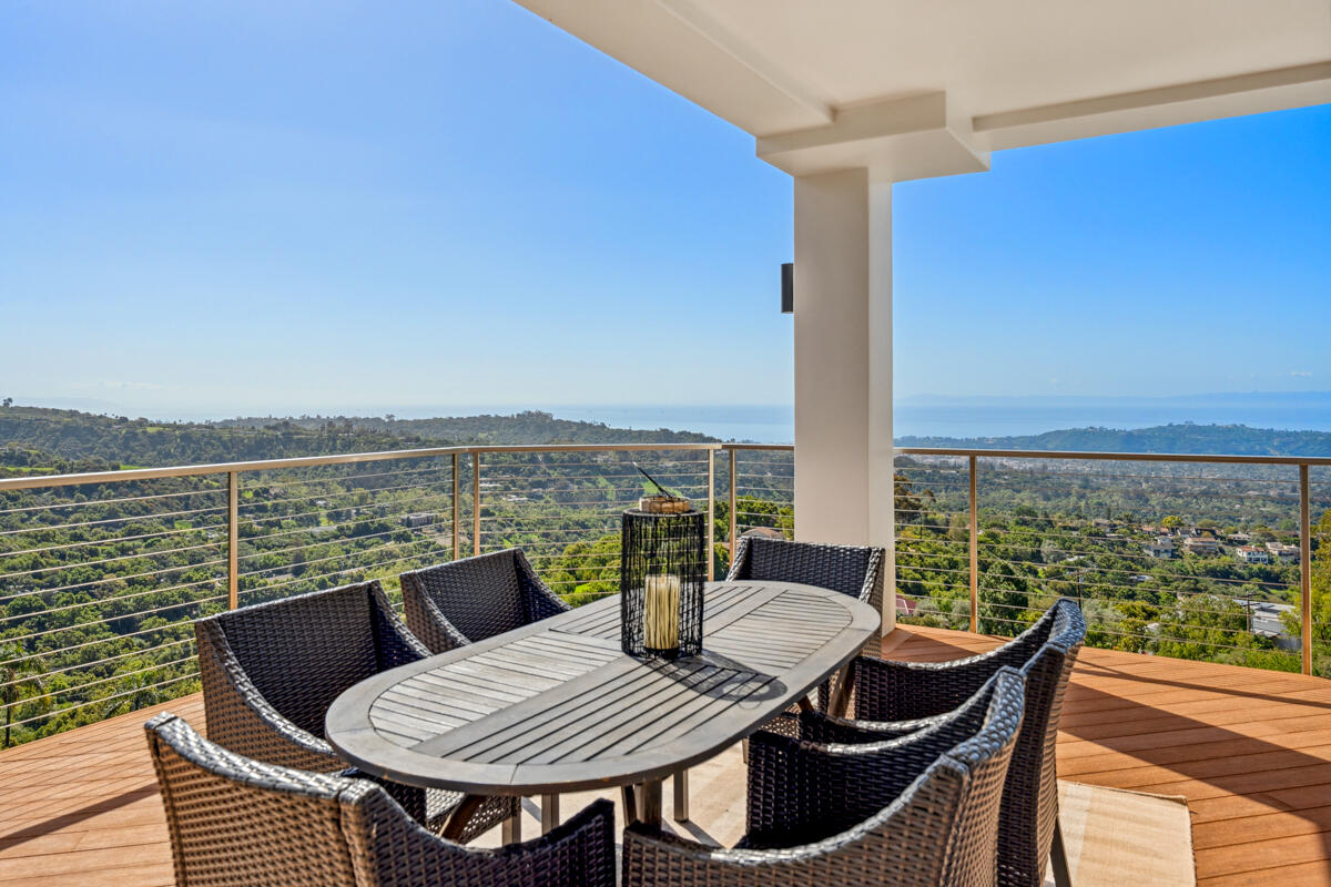 2870 Holly Road Santa Barbara, CA 93105 - Photo 11 of 39 a view of a balcony with table and chairs