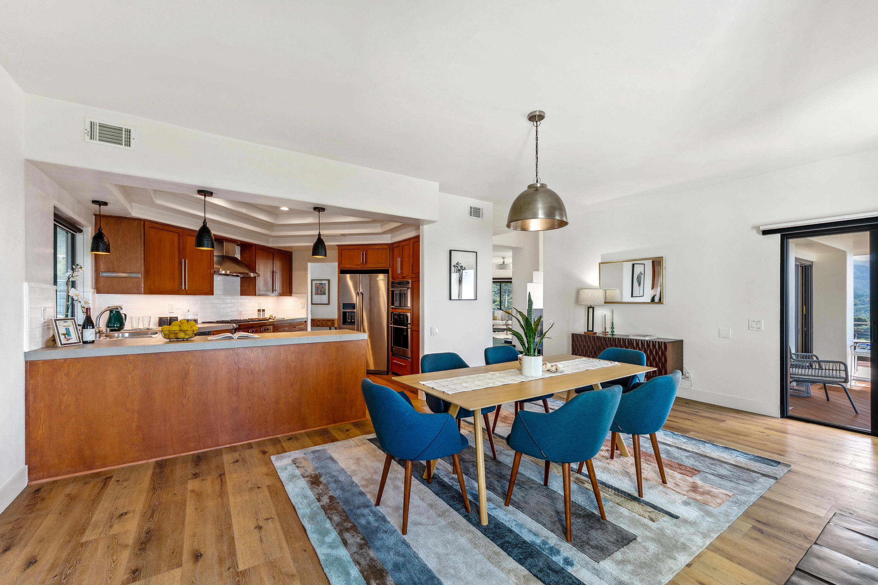2870 Holly Road Santa Barbara, CA 93105 - Photo 17 of 39 a view of a dining room with furniture window and wooden floor