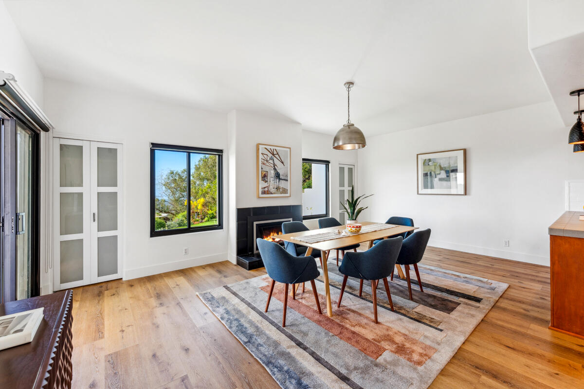 2870 Holly Road Santa Barbara, CA 93105 - Photo 19 of 39 a view of a dining room with furniture and a window