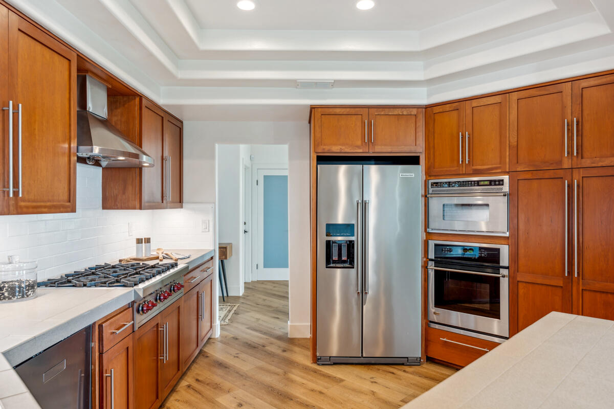 2870 Holly Road Santa Barbara, CA 93105 - Photo 20 of 39 a kitchen with stainless steel appliances granite countertop a refrigerator and a stove top oven