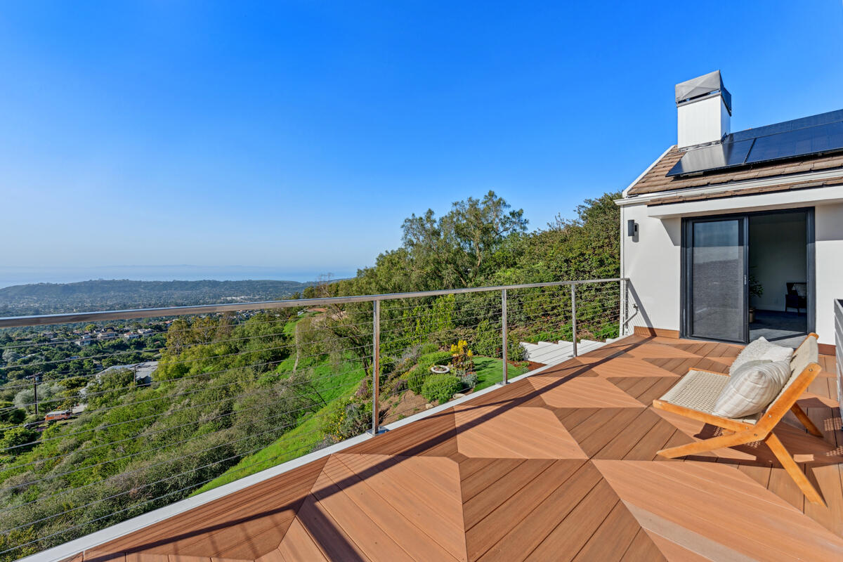 2870 Holly Road Santa Barbara, CA 93105 - Photo 25 of 39 a view of a balcony with chair and wooden floor