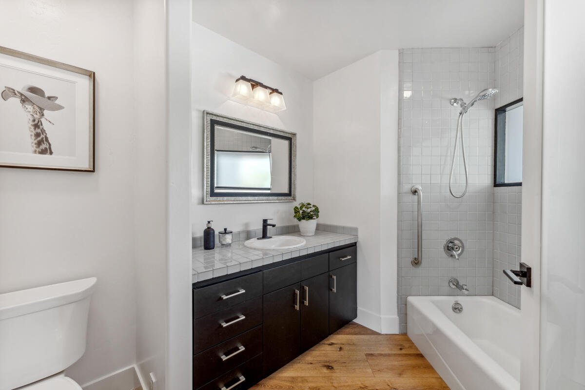 2870 Holly Road Santa Barbara, CA 93105 - Photo 31 of 39 a spacious bathroom with a tub sink and mirror