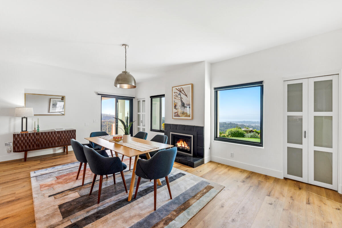 2870 Holly Road Santa Barbara, CA 93105 - Photo 7 of 39 a view of a dining room with furniture window and wooden floor