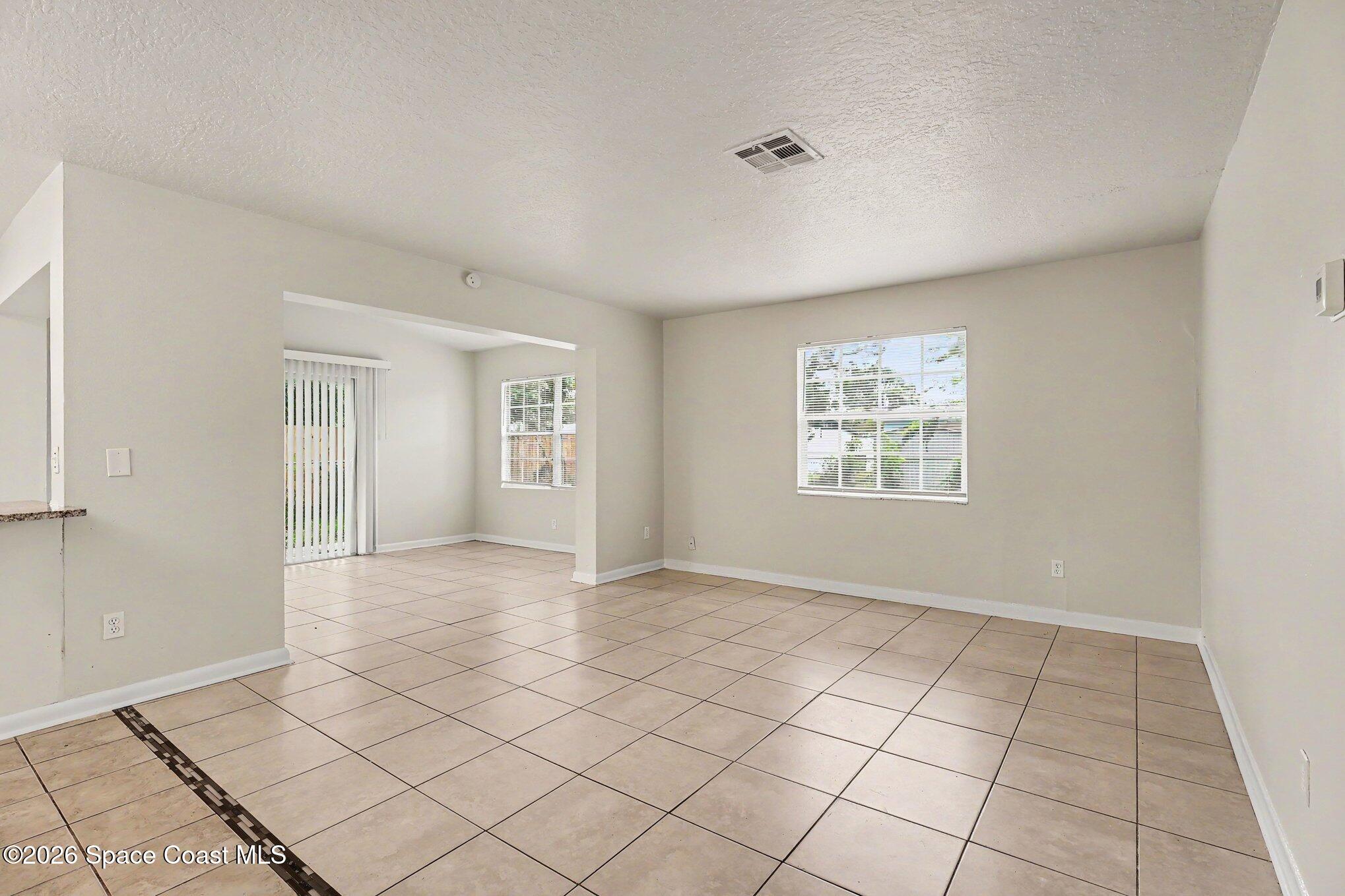 1077 Judith Terrace Rockledge, FL 32955 - Photo 4 of 26 004_file_1330