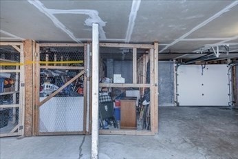 38 Dunham Road, Unit 109 Beverly, MA 01915 - Photo 24 of 24 a view of a garage