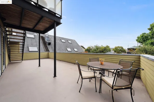 a patio with water table and chairs