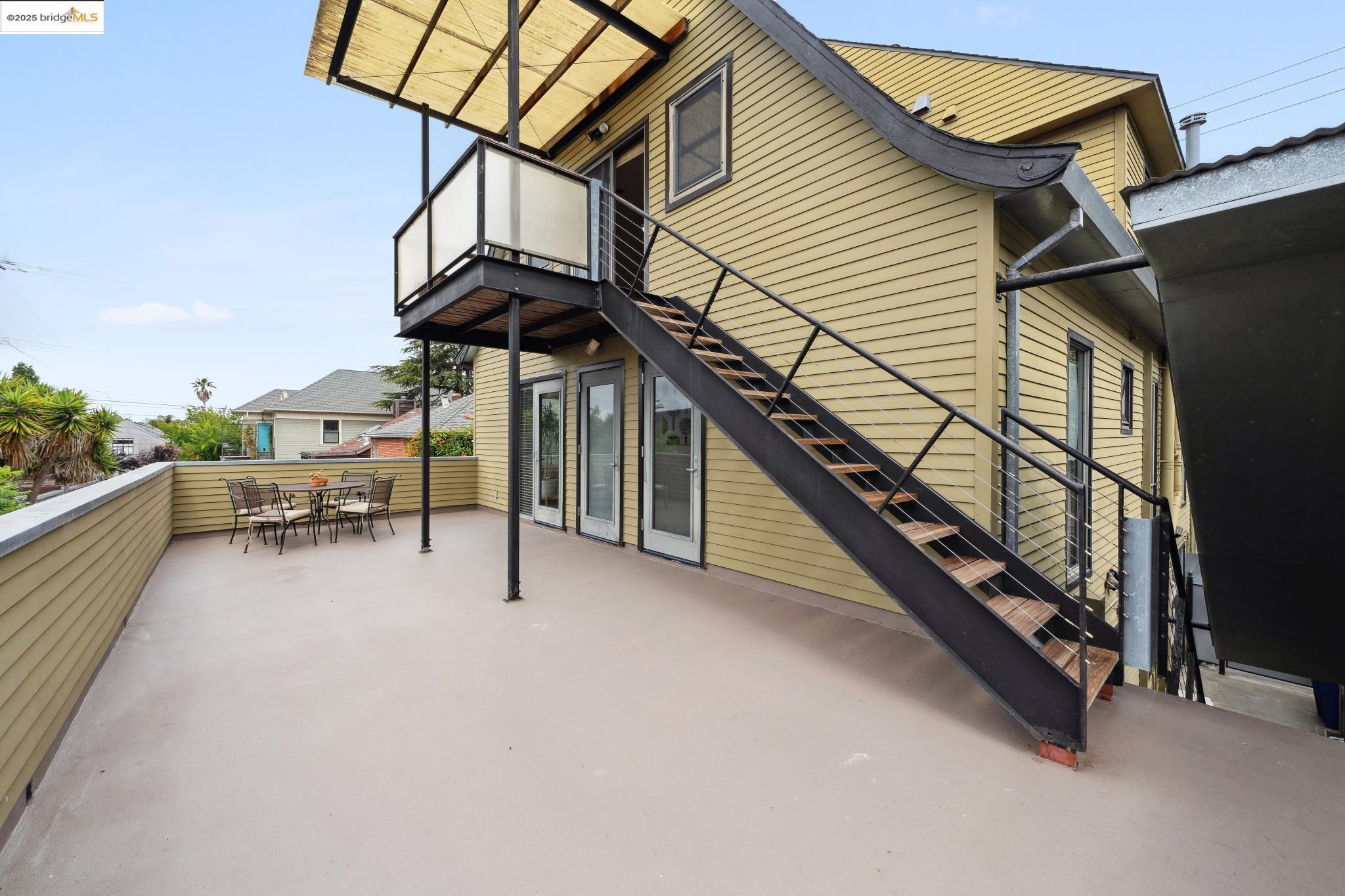 1010 Grayson Street Berkeley, CA 94710 - Photo 18 of 35 a view of a terrace with chairs and a potted plant
