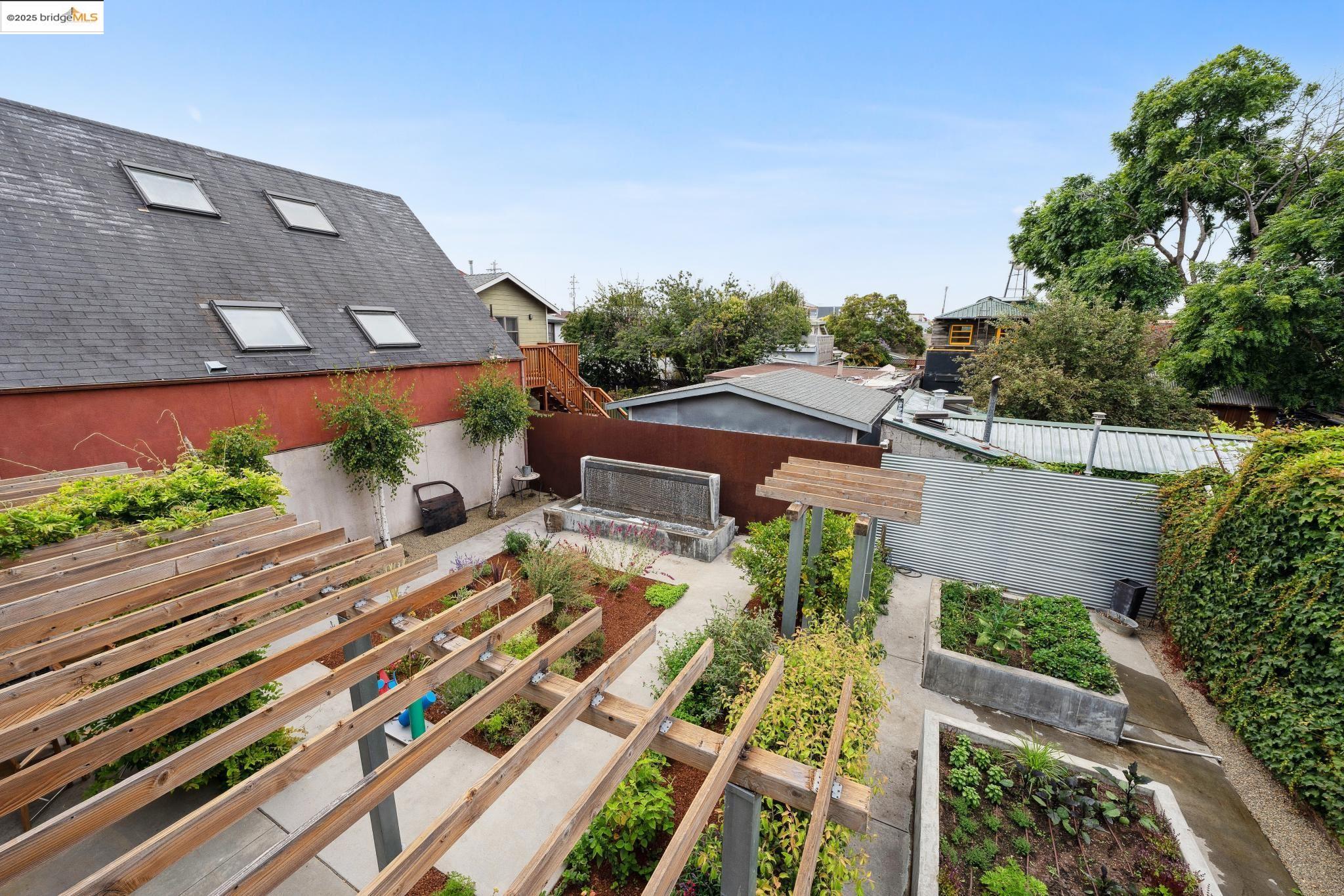 1010 Grayson Street Berkeley, CA 94710 - Photo 19 of 35 a view of a house with a yard