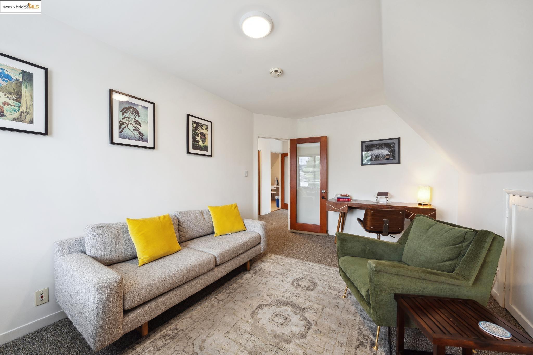 1010 Grayson Street Berkeley, CA 94710 - Photo 20 of 35 a living room with furniture and a couch