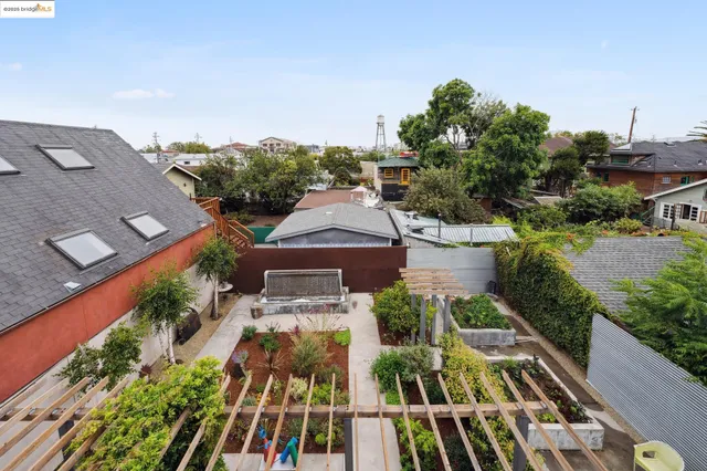 an aerial view of multiple houses with yard
