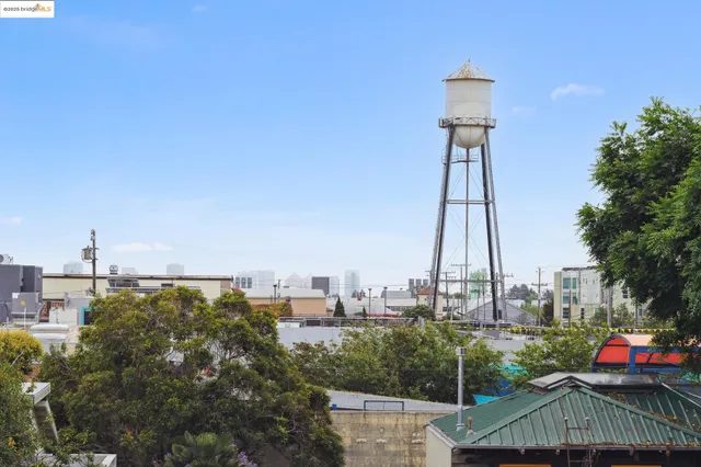 a front view of a residential apartment building with a yard
