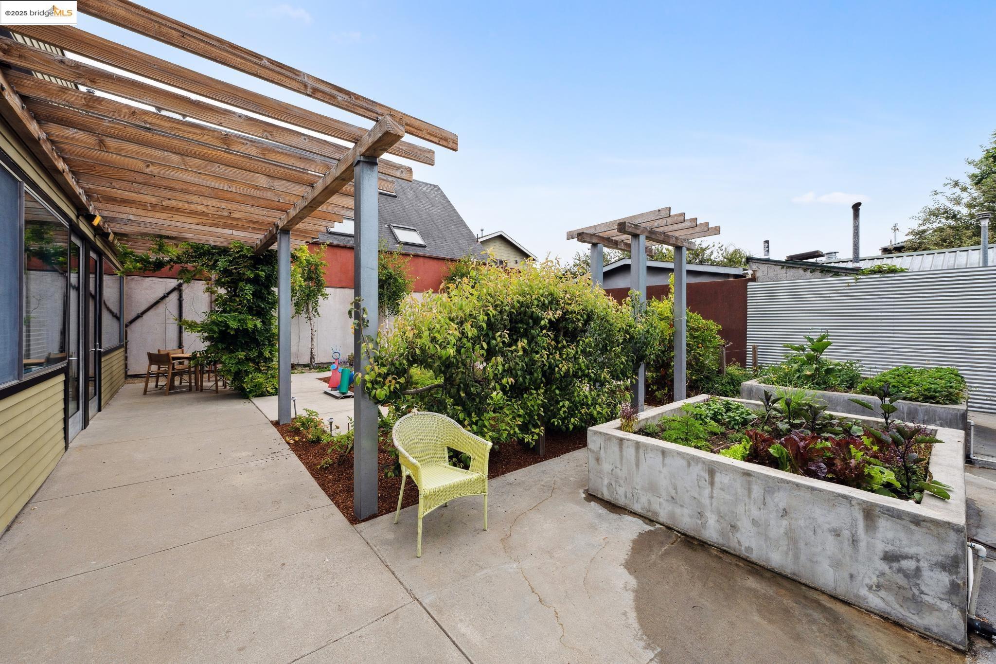 1010 Grayson Street Berkeley, CA 94710 - Photo 29 of 35 a view of a chair and tables in the patio