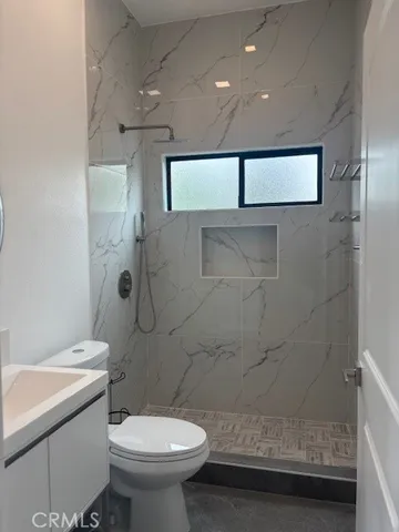 a view of an empty room with a fireplace