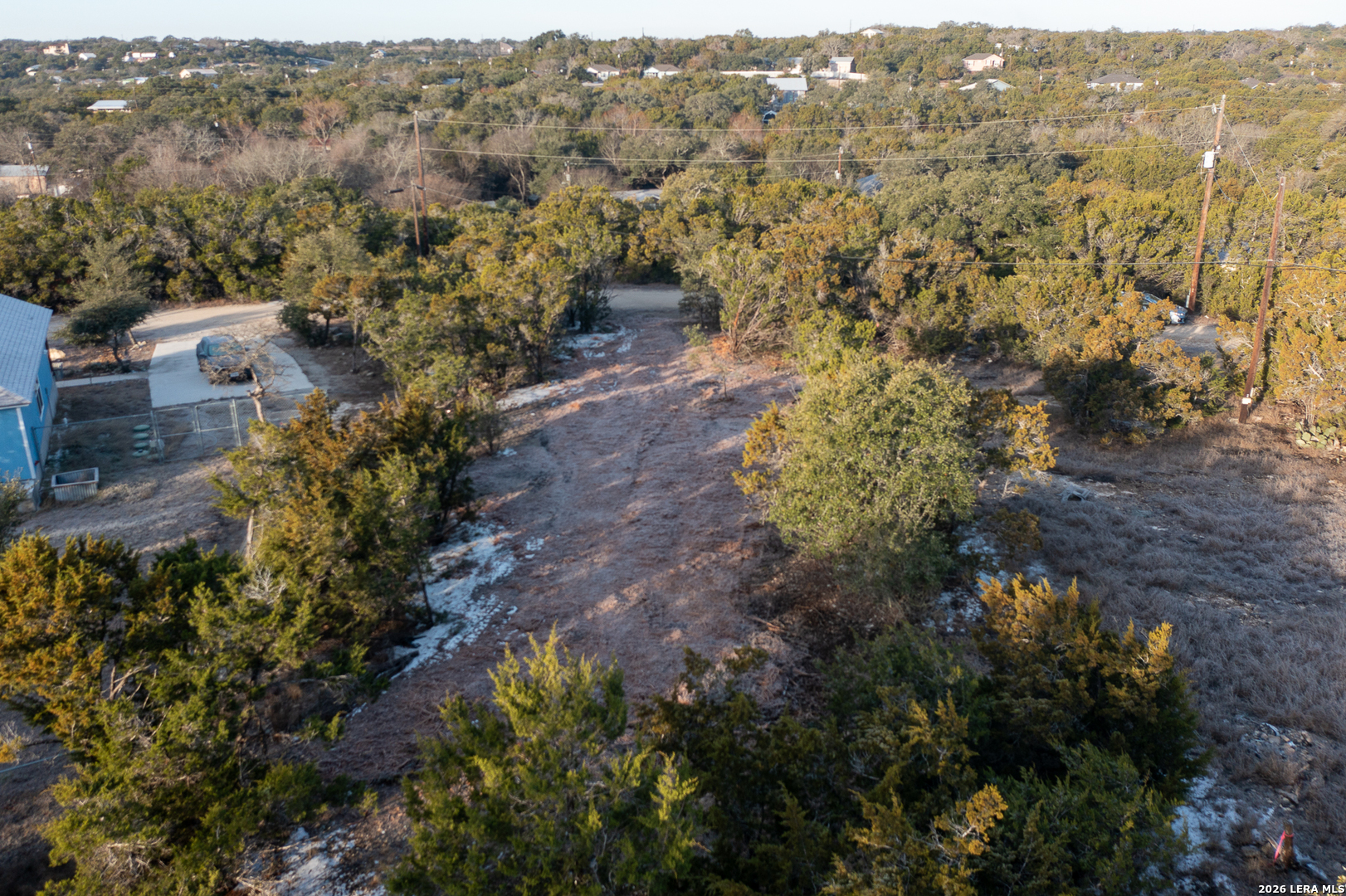 1531 Lake Drive Spring Branch, TX 78070 - Photo 7 of 9 a view of a city with lush green forest