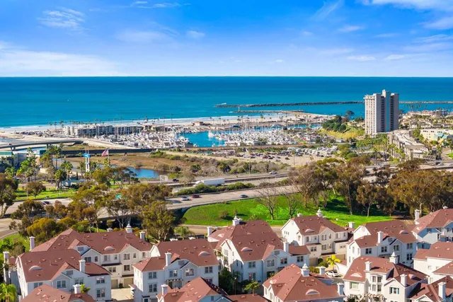 a view of a city with an ocean view
