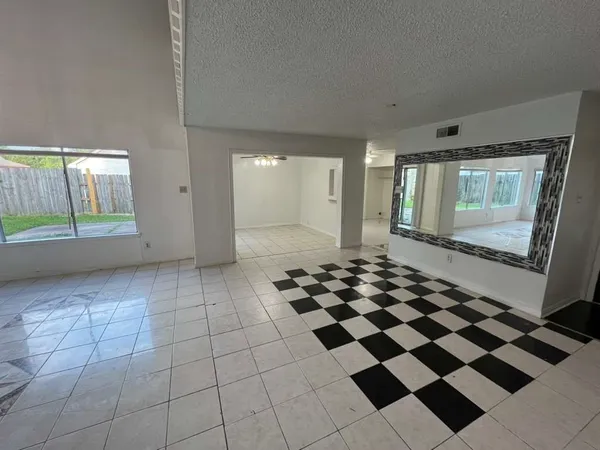 a view of a black and white checkered floor