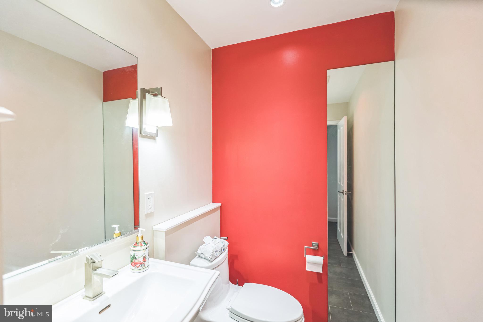 4008 Briars Road Olney, MD 20832 - Photo 26 of 32 a bathroom with a sink and a mirror