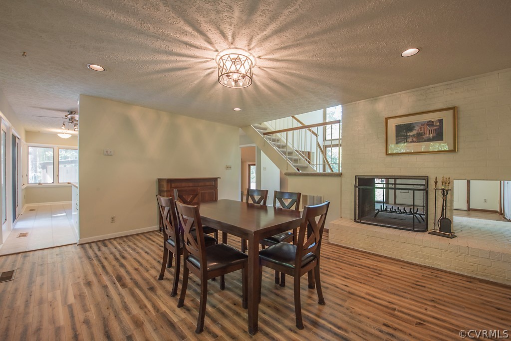 14200 Long Gate Road Midlothian, VA 23112 - Photo 16 of 27 a view of a dining room with furniture and wooden floor