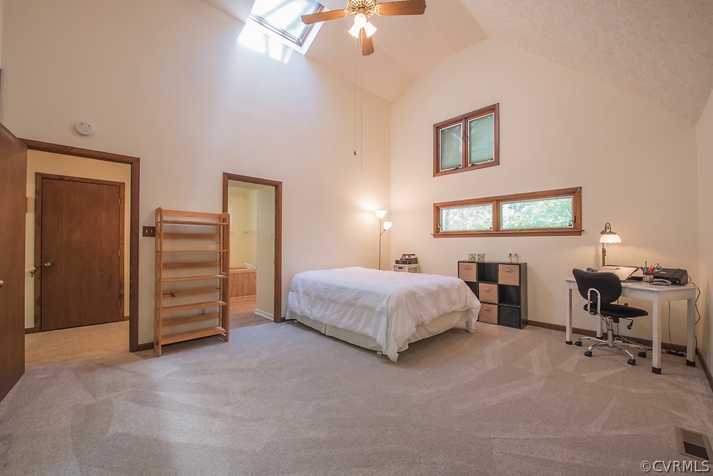 14200 Long Gate Road Midlothian, VA 23112 - Photo 17 of 27 a spacious bedroom with a bed a desk and chair
