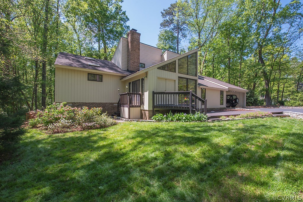 14200 Long Gate Road Midlothian, VA 23112 - Photo 2 of 27 a house with green field in front of it