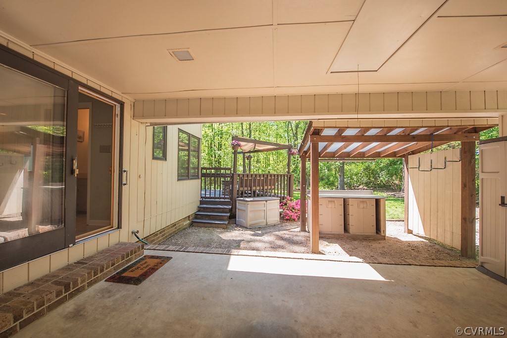 14200 Long Gate Road Midlothian, VA 23112 - Photo 26 of 27 a backyard of a house with a fountain table and chairs