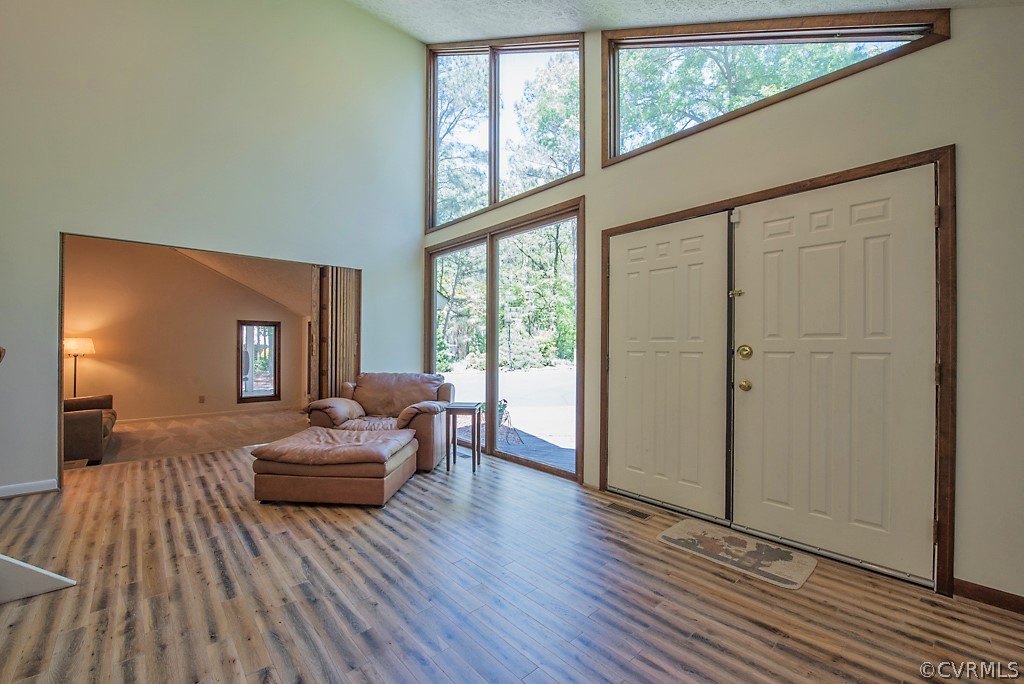 14200 Long Gate Road Midlothian, VA 23112 - Photo 4 of 27 a living room with furniture and a large window