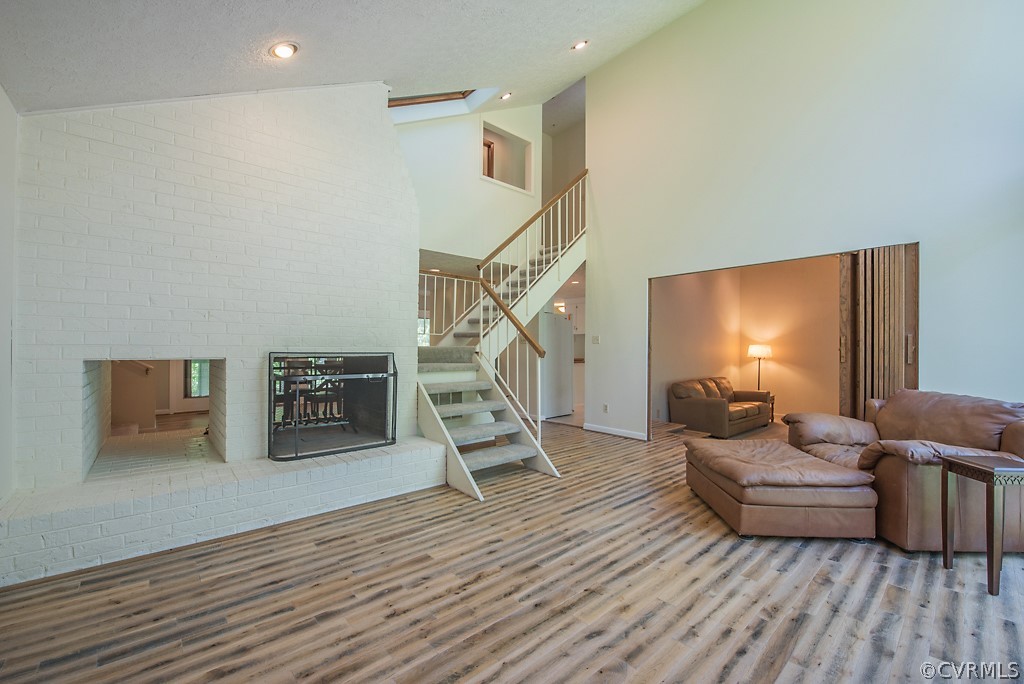 14200 Long Gate Road Midlothian, VA 23112 - Photo 6 of 27 a living room with furniture and a wooden floor