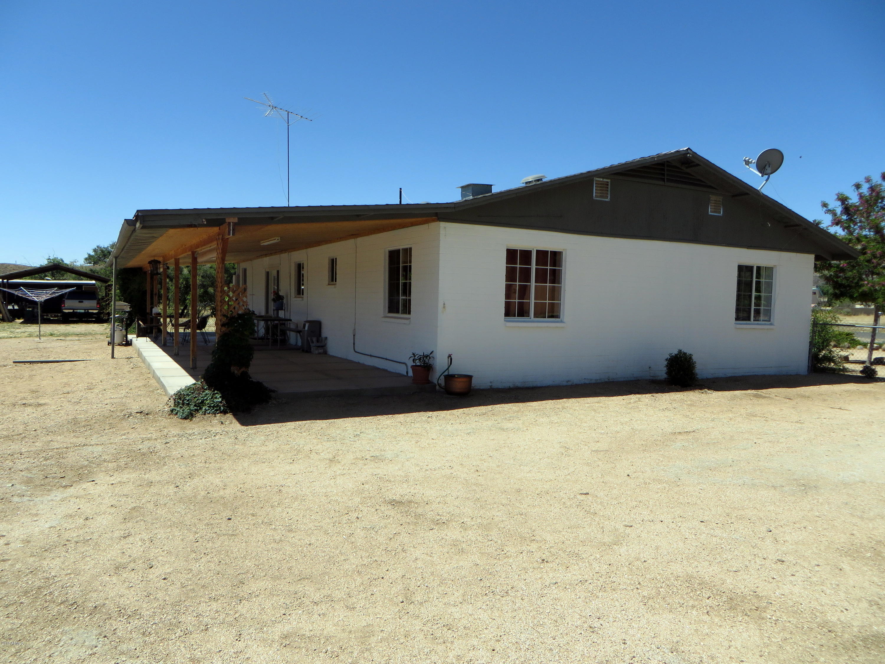 18631 Peeples Valley Road Peeples Valley, AZ 86332 - Photo 44 of 45 North side and back of home