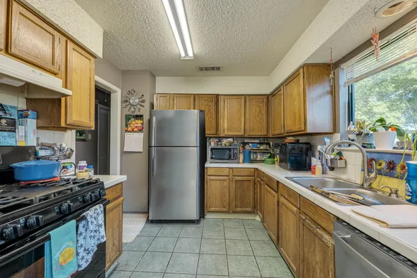 $650,000 | 12301 Deer Falls Drive, Unit A & B, Austin, TX 78729