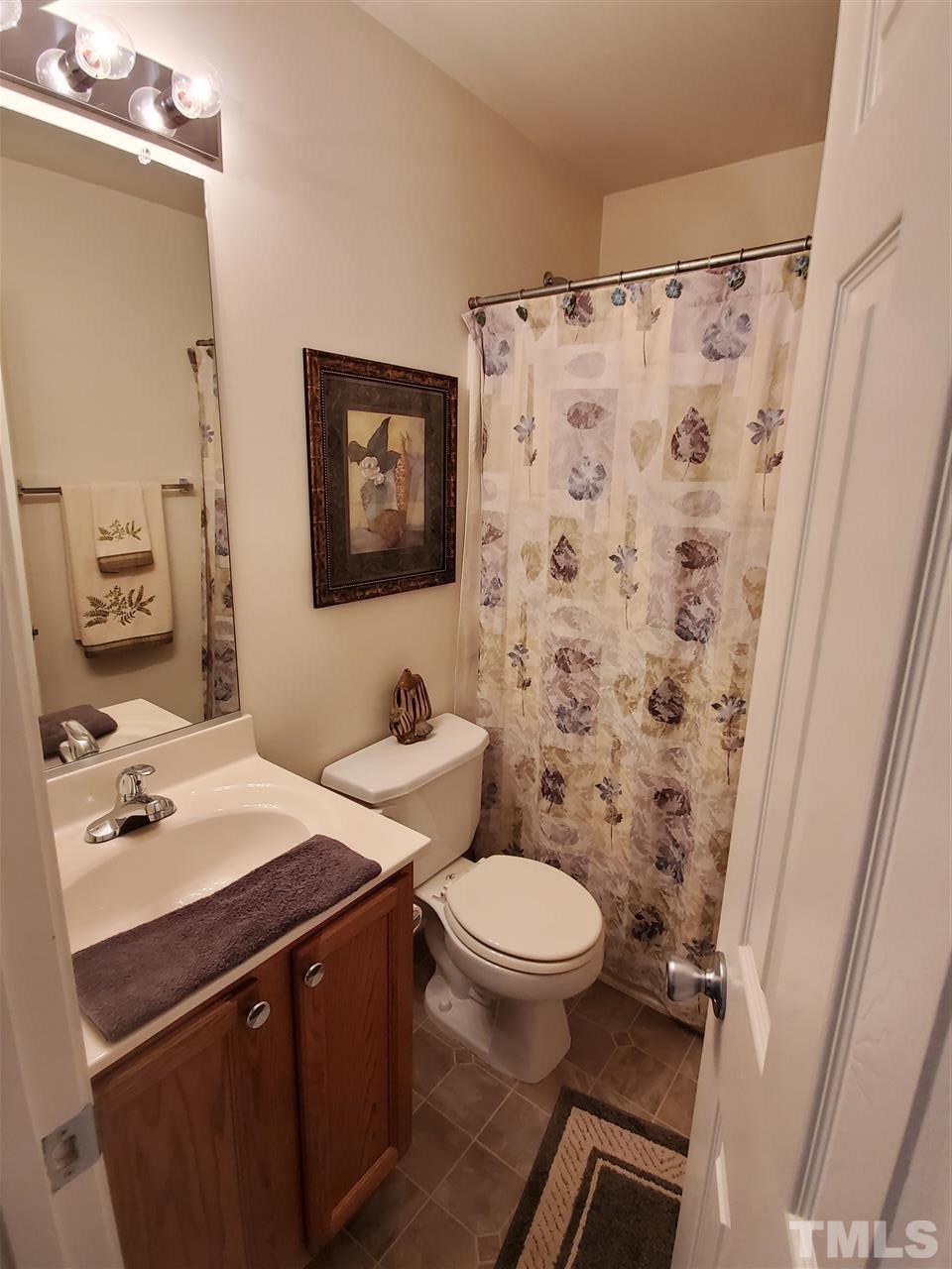 109 Chalcedony Street Raleigh, NC 27603 - Photo 4 of 25 Upstairs bathroom