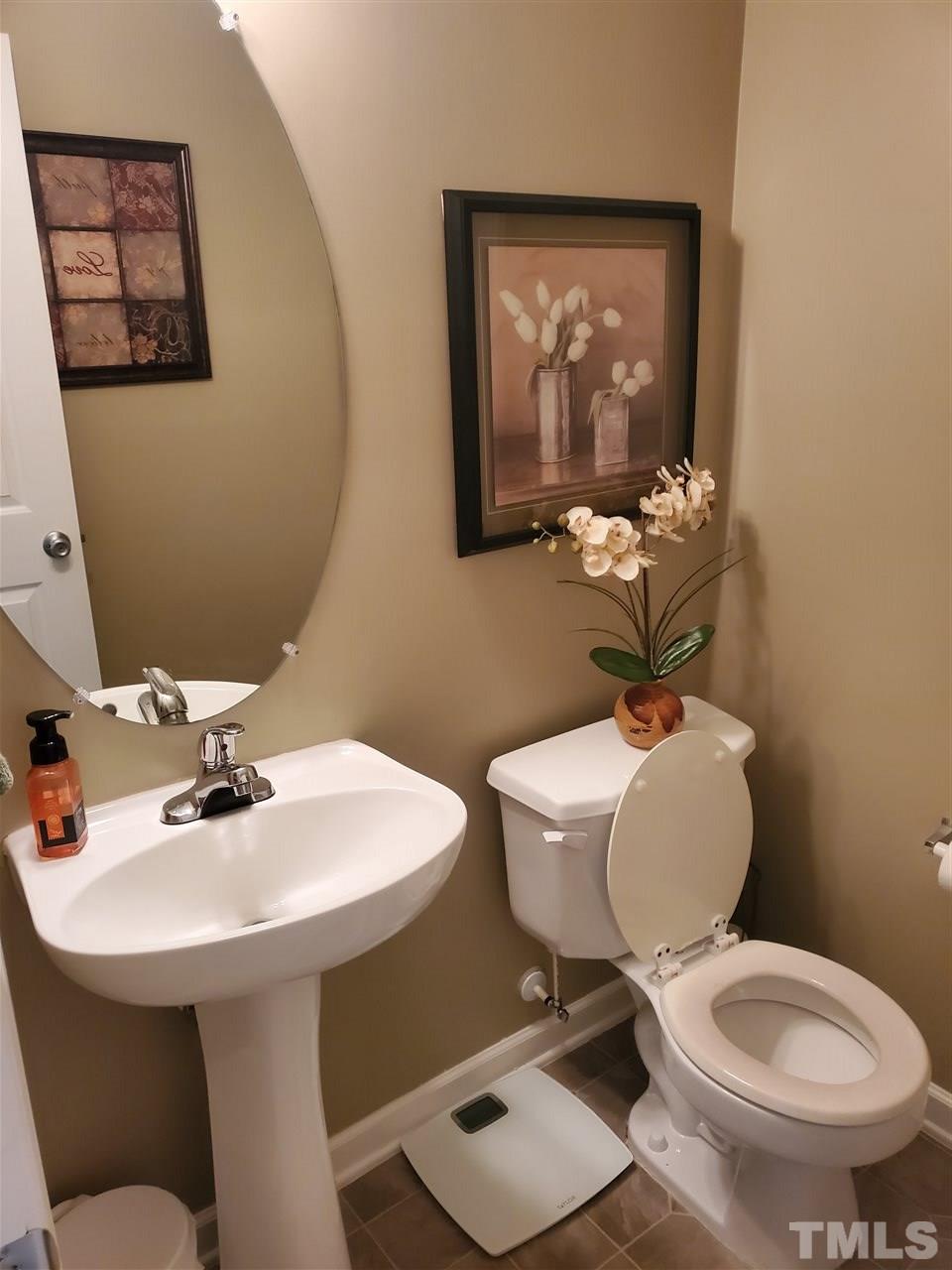 109 Chalcedony Street Raleigh, NC 27603 - Photo 9 of 25 Downstairs powder room
