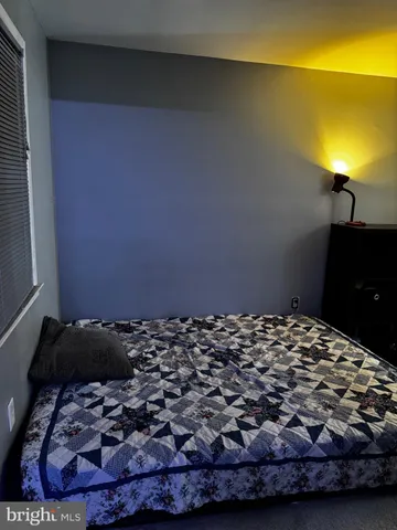 a bedroom with a bed