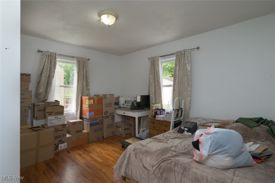 3234 Bell Wick Road Hubbard, OH 44425 - Photo 20 of 27 Bedroom with light wood-style floors and multiple windows