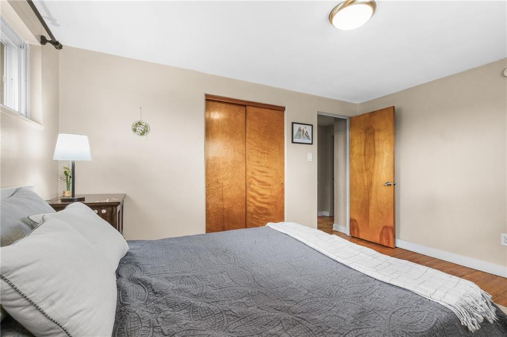 1654 Hollyrood Road Pittsburgh, PA 15227 - Photo 13 of 33 a bedroom with a bed and a window