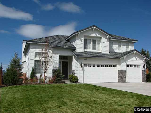 4871 Grousecreek Court Reno, NV 89519 - Photo 1 of 9 a front view of a house with a yard