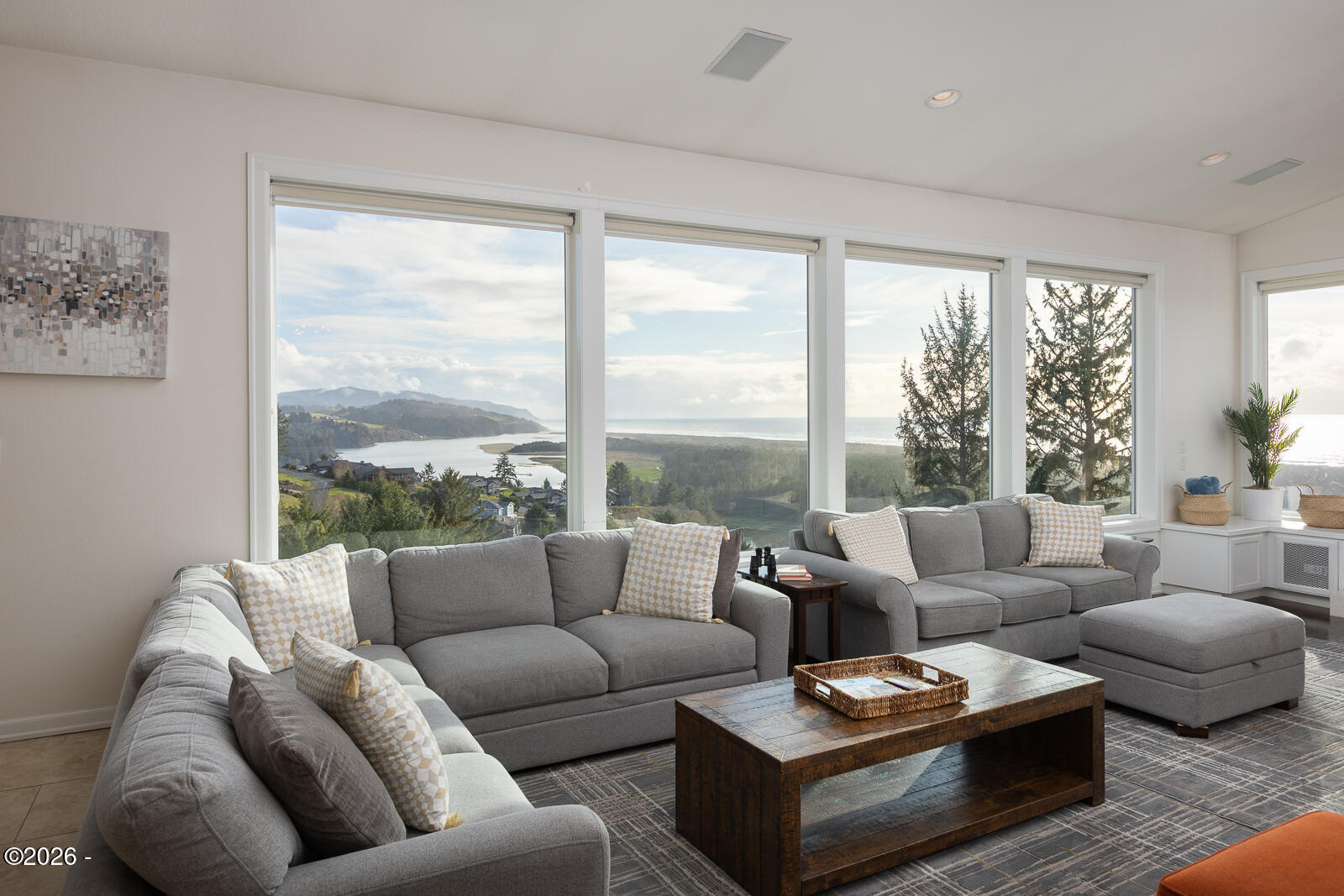 7415 East Summit Road Pacific City, OR 97135 - Photo 7 of 44 a living room with furniture and a large window