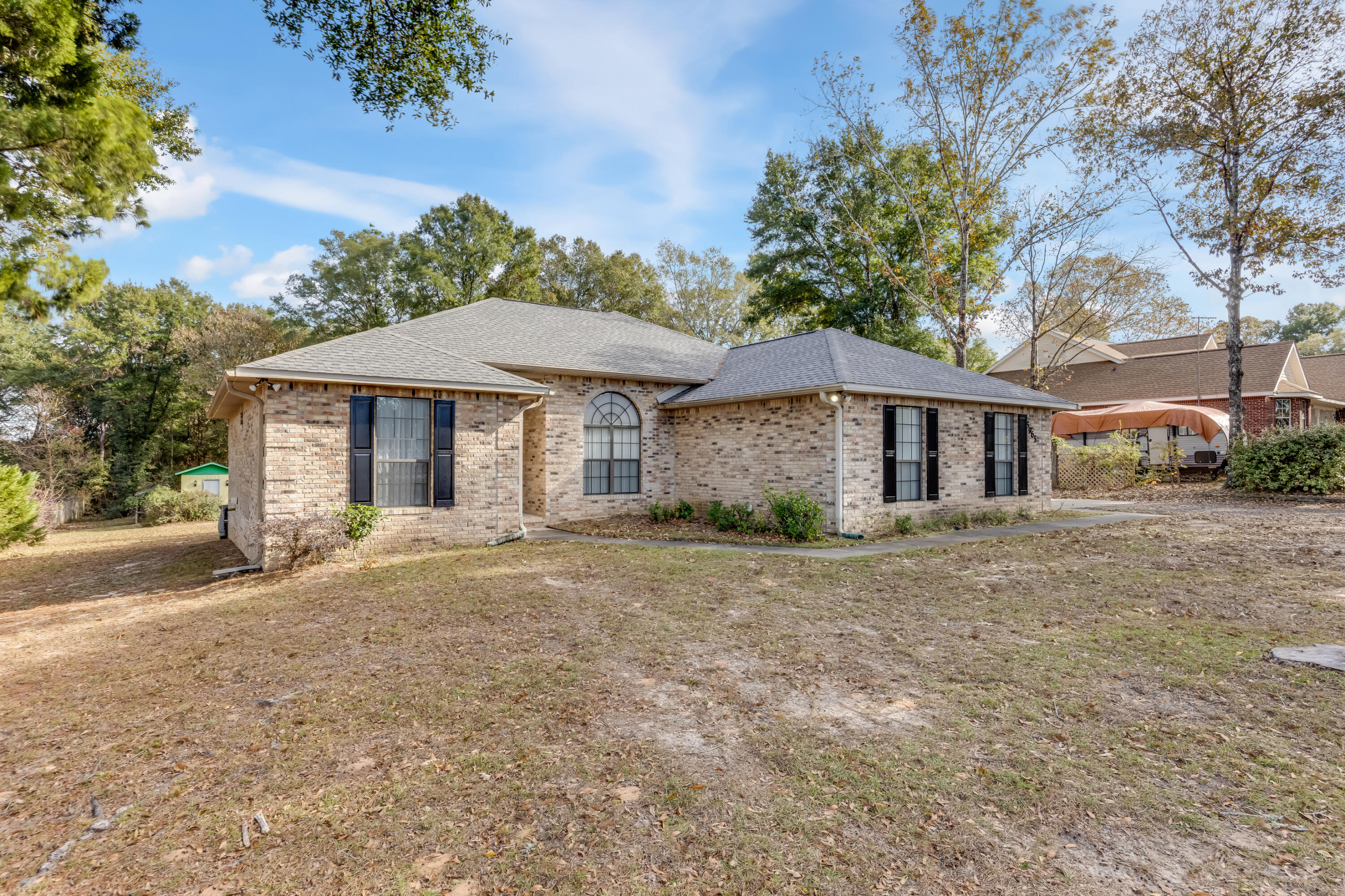 5965 Oak Hill Road Crestview, FL 32536 - Photo 2 of 44 front view of a house with a yard