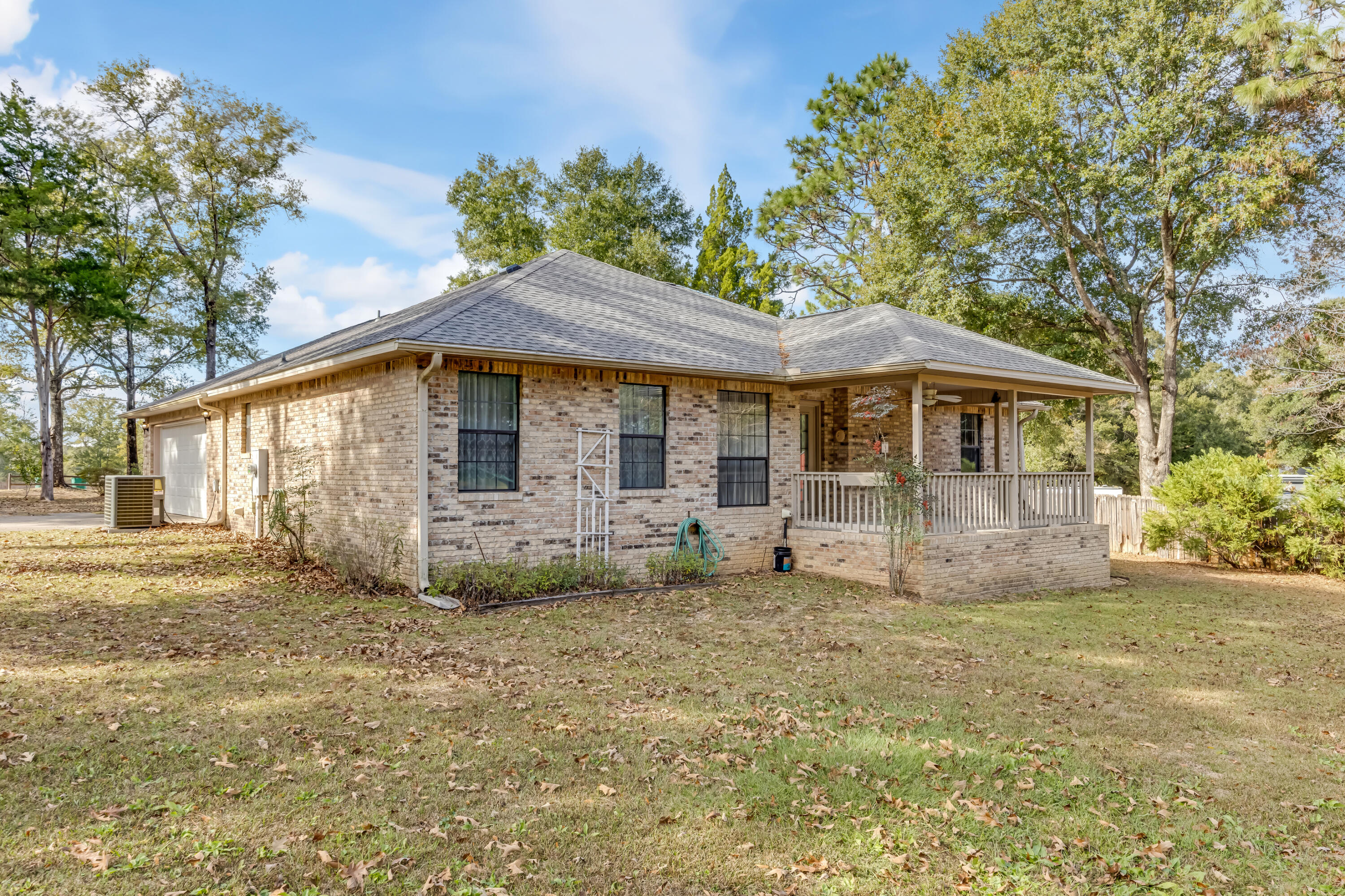 5965 Oak Hill Road Crestview, FL 32536 - Photo 35 of 44 a view of a house with a yard
