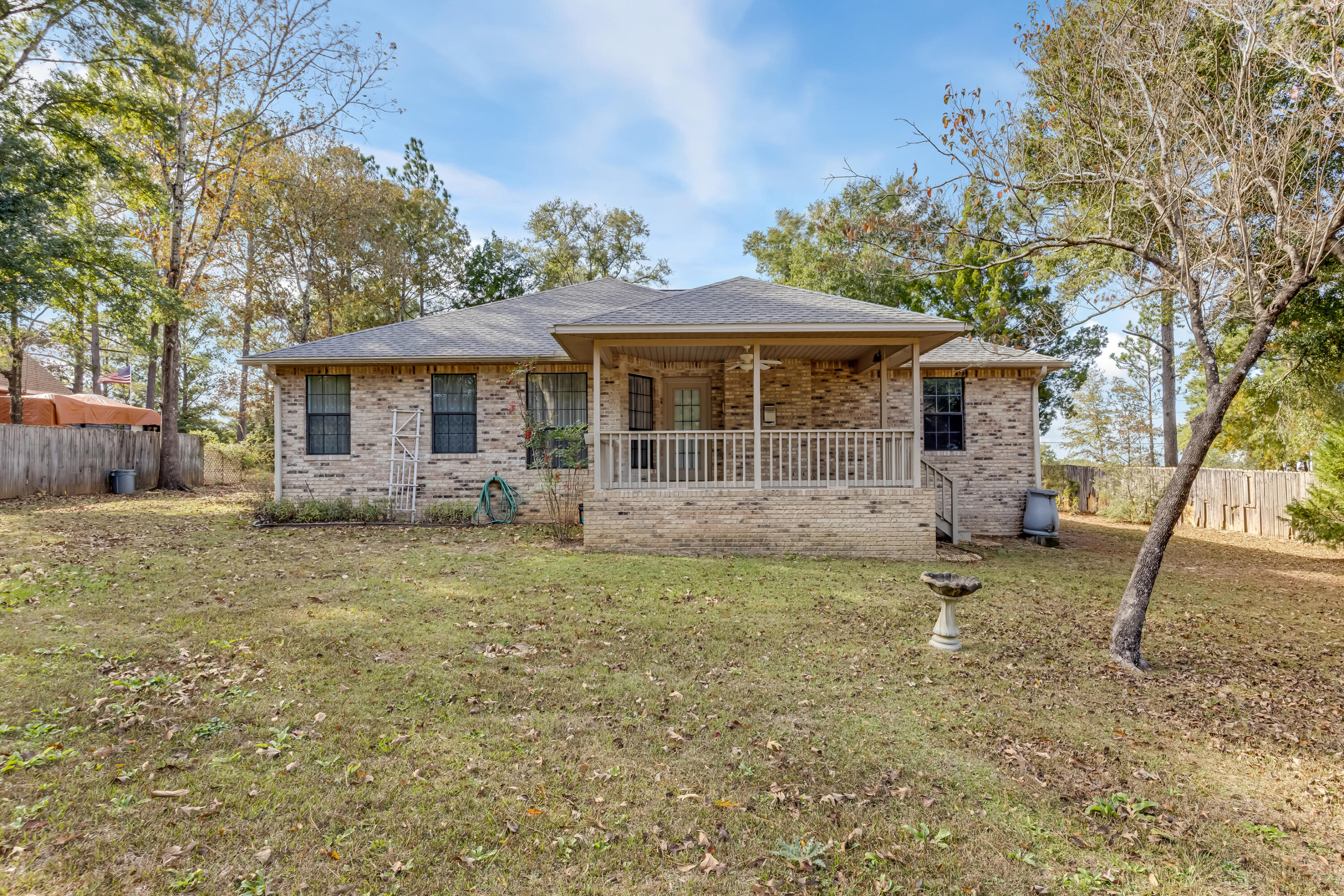 5965 Oak Hill Road Crestview, FL 32536 - Photo 36 of 44 a view of a house with a yard