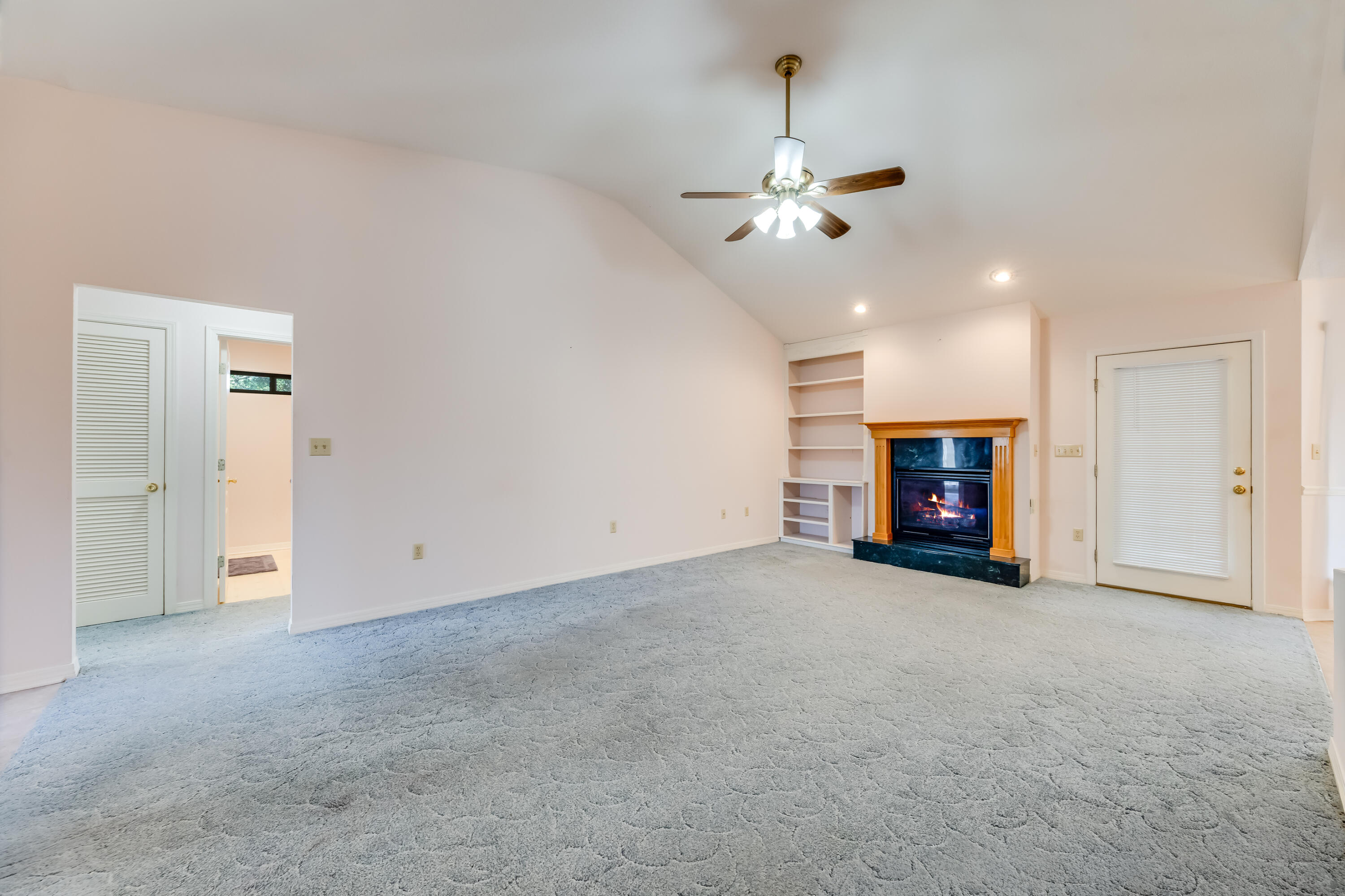 5965 Oak Hill Road Crestview, FL 32536 - Photo 5 of 44 a view of an empty room with a fireplace