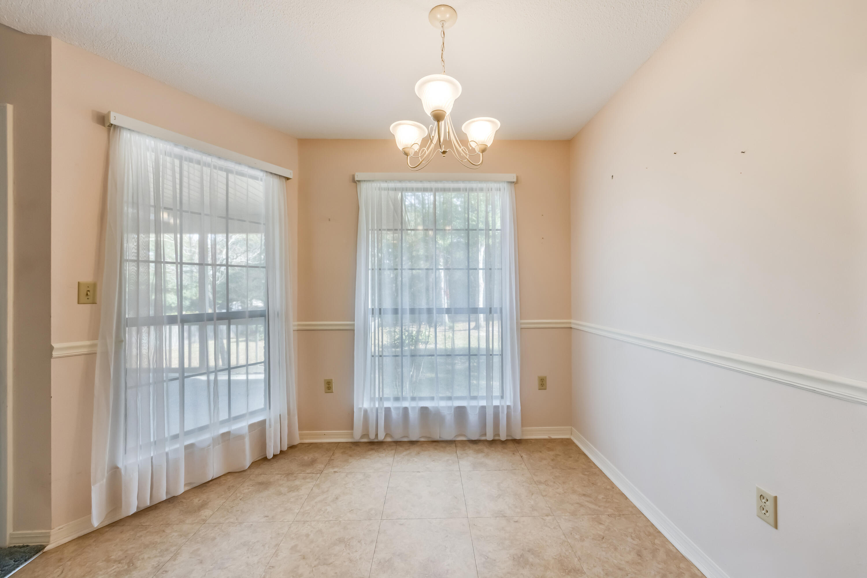 5965 Oak Hill Road Crestview, FL 32536 - Photo 9 of 44 a view of livingroom with window