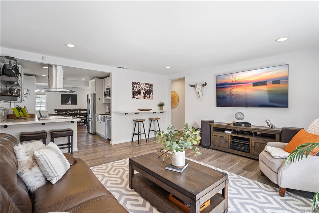 14709 Bodger Avenue Hawthorne, CA 90250 - Photo 1 of 24 a living room with furniture and a flat screen tv