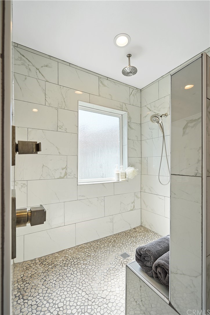 14709 Bodger Avenue Hawthorne, CA 90250 - Photo 11 of 24 a bathroom with a granite countertop shower and a sink