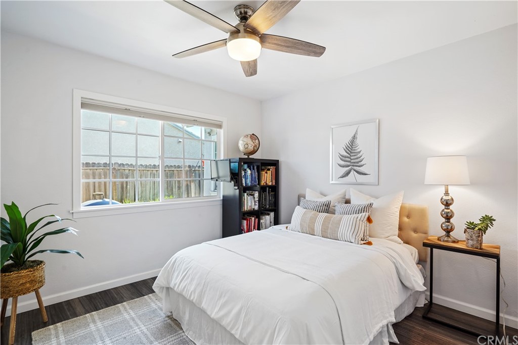 14709 Bodger Avenue Hawthorne, CA 90250 - Photo 13 of 24 a bedroom with a large bed and a chandelier