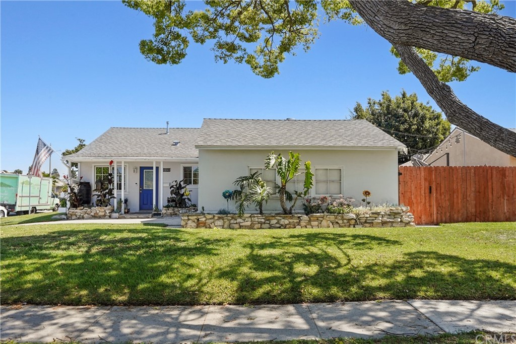 14709 Bodger Avenue Hawthorne, CA 90250 - Photo 3 of 24 a front view of a house with a garden